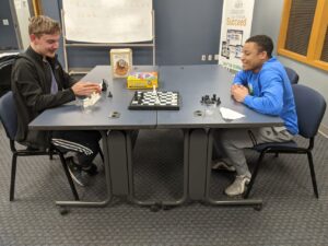 two young men playing chess